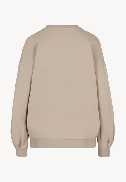 Beżowa bluza oversize z kwiatową aplikacją ORISA